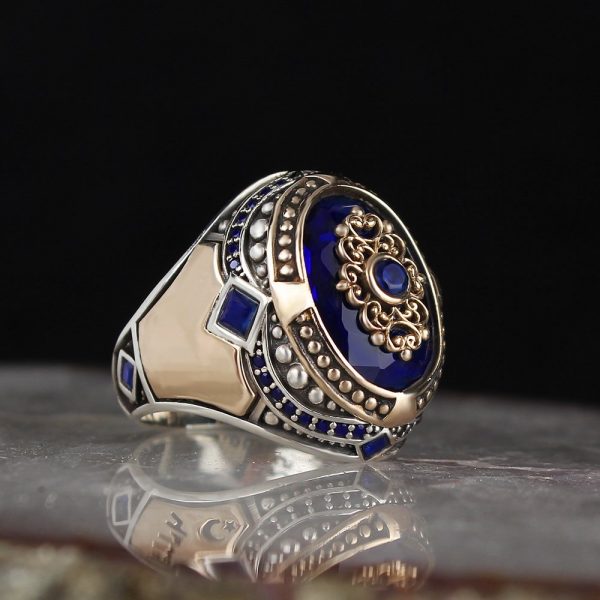 خاتم فضة عيار 925 مرصع بحجر الزيركون الازرق بتصميم مميز